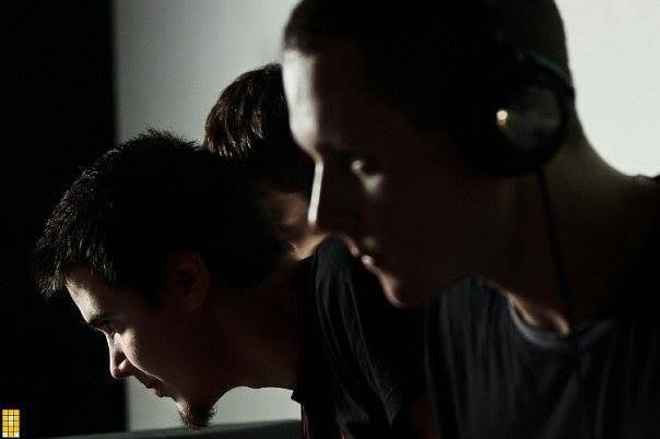 Two producers concentrating during a performance